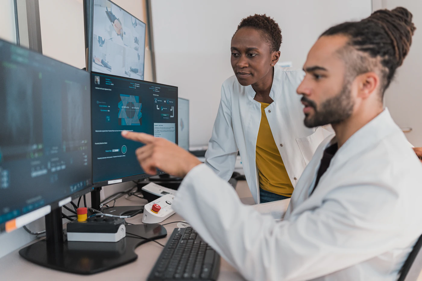 Two physicians reviewing a patient's imaging